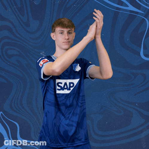 A Man Wearing A Blue Shirt That Says Sap On It GIF