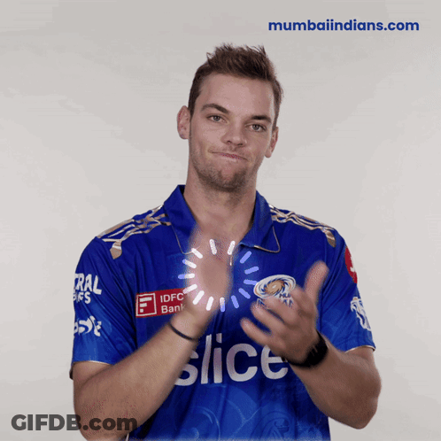 A Man Wearing A Blue Shirt That Says Slice Is Clapping His Hands GIF