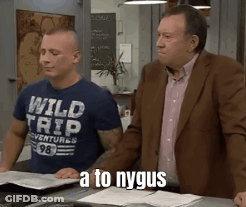 A Man Wearing A Blue Shirt That Says Wild Trip GIF