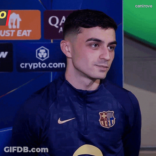 A Man Wearing A Blue Shirt With A Fcb Logo On It GIF