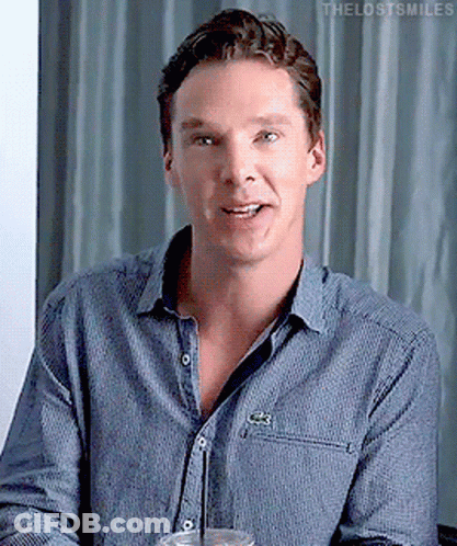 A Man Wearing A Blue Shirt With A Lacoste Logo On His Chest GIF