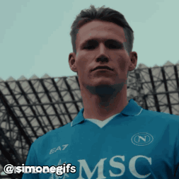 A Man Wearing A Blue Shirt With Msc Written On It GIF