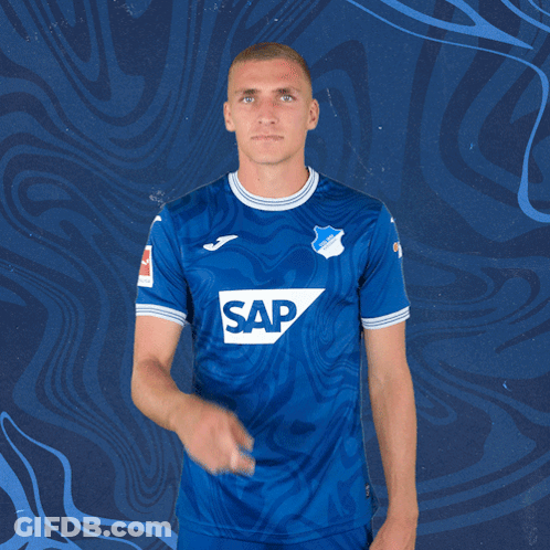 A Man Wearing A Blue Shirt With Sap On It GIF
