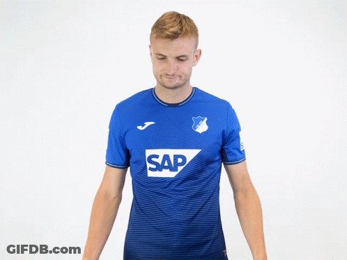 A Man Wearing A Blue Shirt With Sap On It GIF
