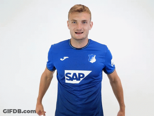 A Man Wearing A Blue Shirt With Sap On It GIF
