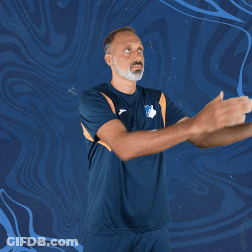 A Man Wearing A Blue Shirt With Sap On It GIF