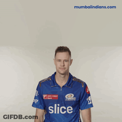 A Man Wearing A Blue Shirt With Slice On It GIF