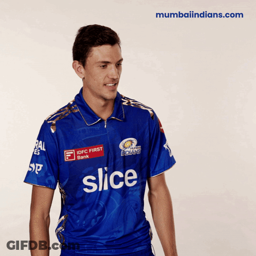 A Man Wearing A Blue Shirt With Slice On It GIF