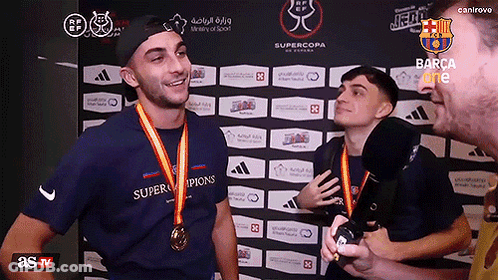 A Man Wearing A Blue Shirt With Super Champions On It GIF