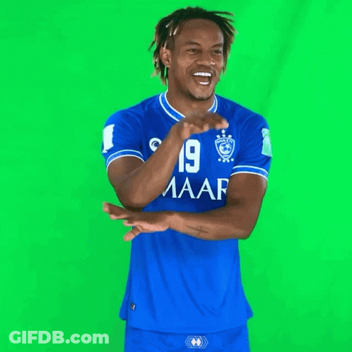A Man Wearing A Blue Shirt With The Number 19 On The Front GIF