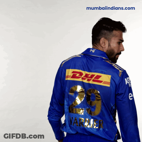 A Man Wearing A Blue Shirt With The Number 29 On The Back GIF