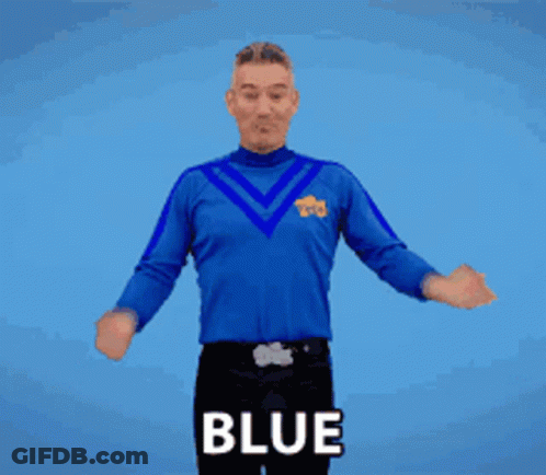A Man Wearing A Blue Shirt With The Word Blue On The Front GIF