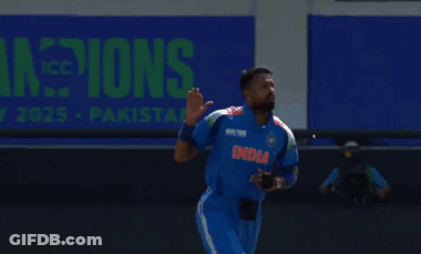 A Man Wearing A Blue Shirt With The Word Indu On The Front GIF