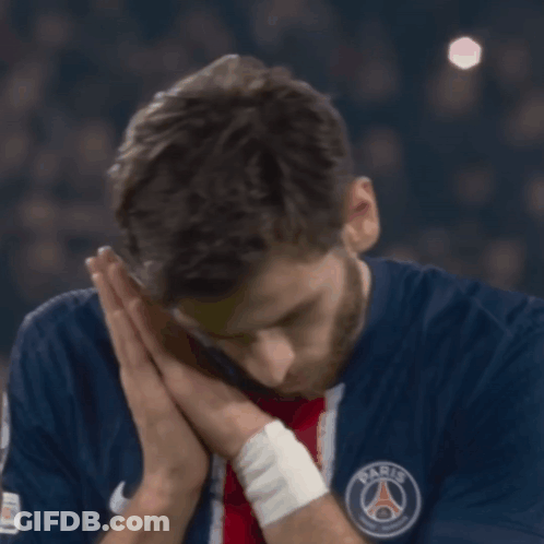 A Man Wearing A Blue Shirt With The Word Paris On The Front GIF