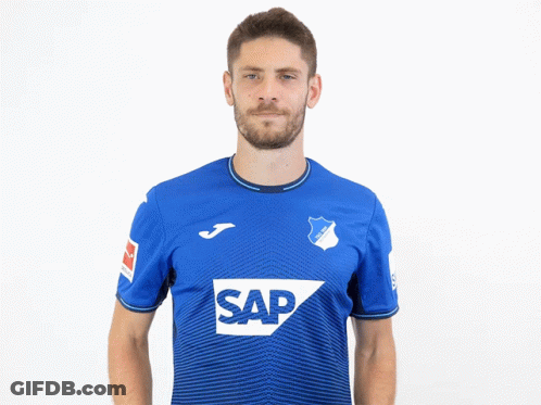 A Man Wearing A Blue Shirt With The Word Sap On It Gives Two Thumbs Up GIF