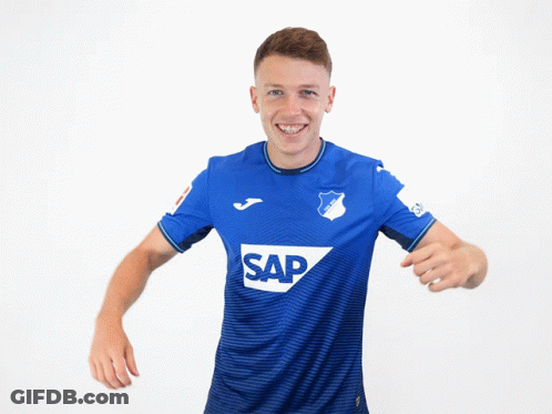 A Man Wearing A Blue Shirt With The Word Sap On The Front GIF