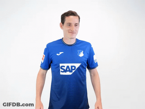 A Man Wearing A Blue Shirt With The Word Sap On The Front GIF