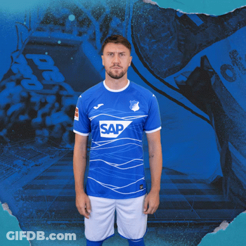 A Man Wearing A Blue Shirt With The Word Sap On The Front GIF