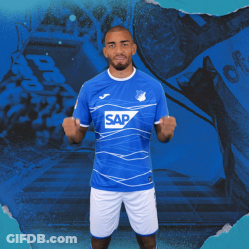 A Man Wearing A Blue Shirt With The Word Sap On The Front GIF