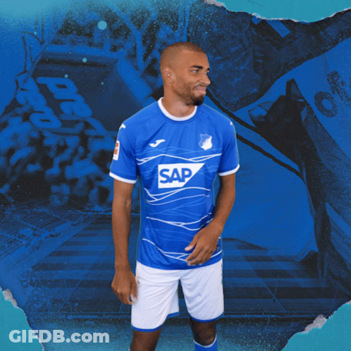 A Man Wearing A Blue Shirt With The Word Sap On The Front GIF