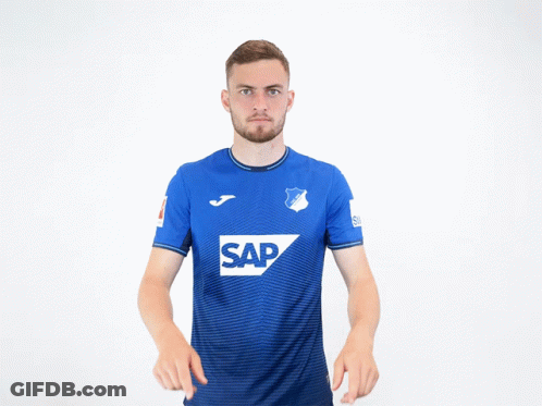 A Man Wearing A Blue Shirt With The Word Sap On The Front GIF