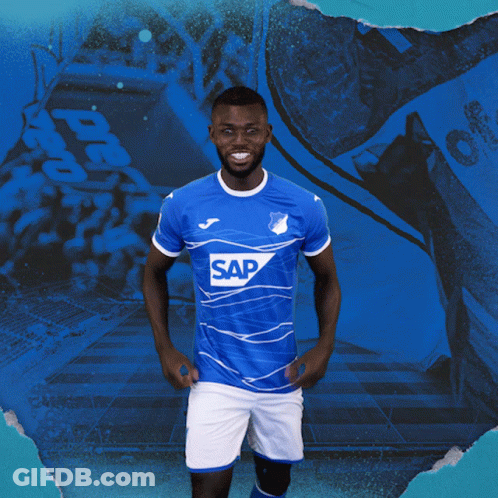 A Man Wearing A Blue Shirt With The Word Sap On The Front GIF