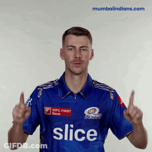 A Man Wearing A Blue Shirt With The Word Slice On The Front GIF