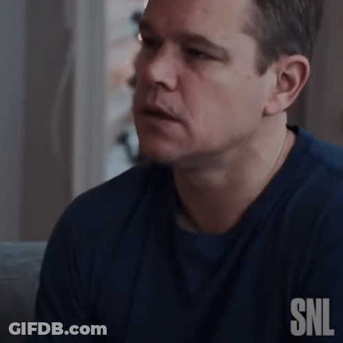 A Man Wearing A Blue Shirt With The Word Snl On The Back Of It GIF