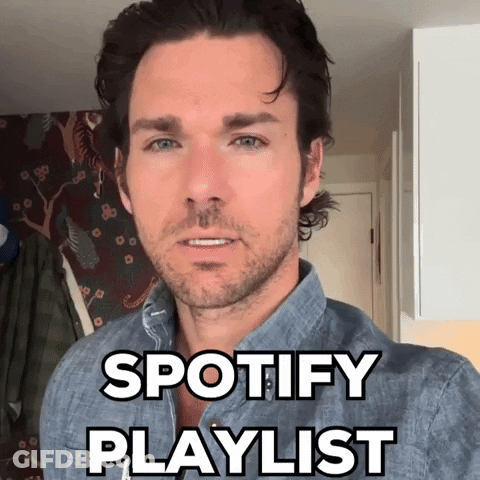 A Man Wearing A Blue Shirt With The Words Spotify Playlist Above Him GIF