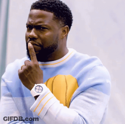 A Man Wearing A Blue Sweater With A Yellow Basketball On It GIF