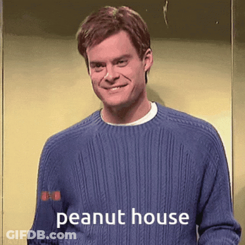 A Man Wearing A Blue Sweater With The Words Peanut House On It GIF