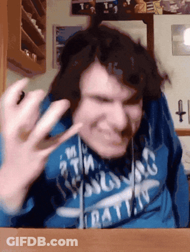 A Man Wearing A Blue Sweatshirt That Says ' Rat ' On It GIF