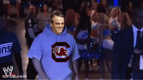 A Man Wearing A Blue Sweatshirt With A C On It GIF