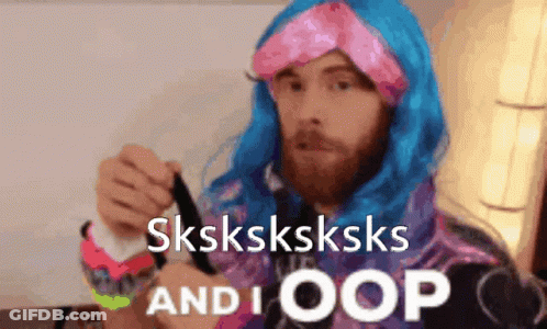 A Man Wearing A Blue Wig And A Pink Headband Says Sksksksksks And I Oops GIF