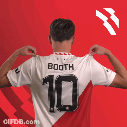 A Man Wearing A Booth Jersey With The Number 10 GIF