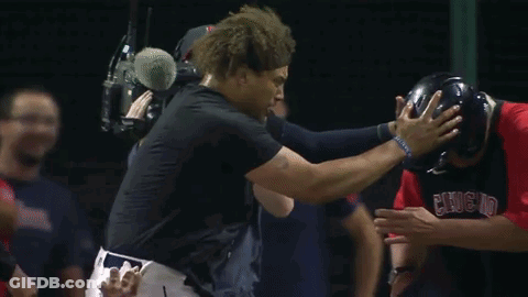 A Man Wearing A Boston Red Sox Hat Is Being Interviewed GIF