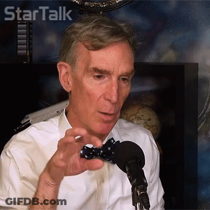 A Man Wearing A Bow Tie Talks Into A Microphone In Front Of A Sign That Says Star Talk GIF
