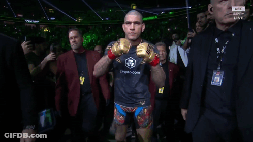 A Man Wearing A Boxing Glove That Says Ufc Live On It GIF