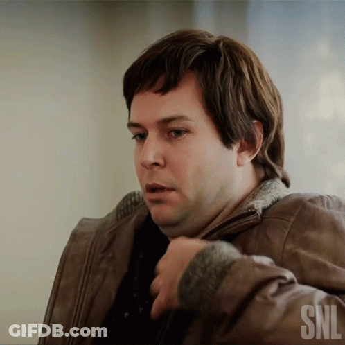 A Man Wearing A Brown Leather Jacket With The Snl Logo On The Bottom GIF