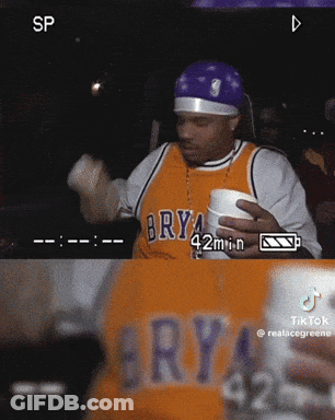 Man In Brya Jersey Holding Cup GIF