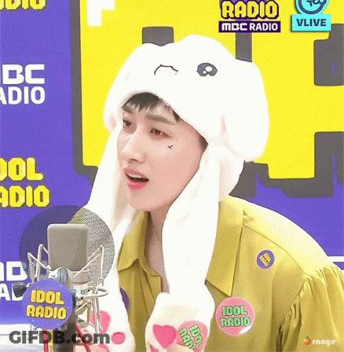 A Man Wearing A Bunny Hat With The Words Idol Radio On The Bottom GIF
