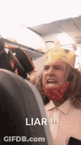 A Man Wearing A Burger King Crown Is Yelling At Another Man GIF