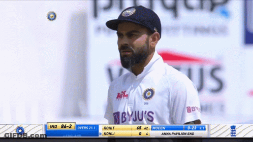 A Man Wearing A Byju 'S Shirt Looks At The Scoreboard During A Cricket Match GIF