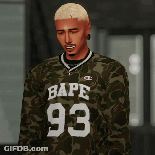 A Man Wearing A Camo Shirt With Bape 93 On The Front GIF