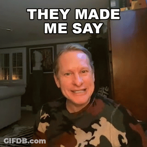 A Man Wearing A Camouflage Sweater Is Smiling And Says They Made Me Say GIF
