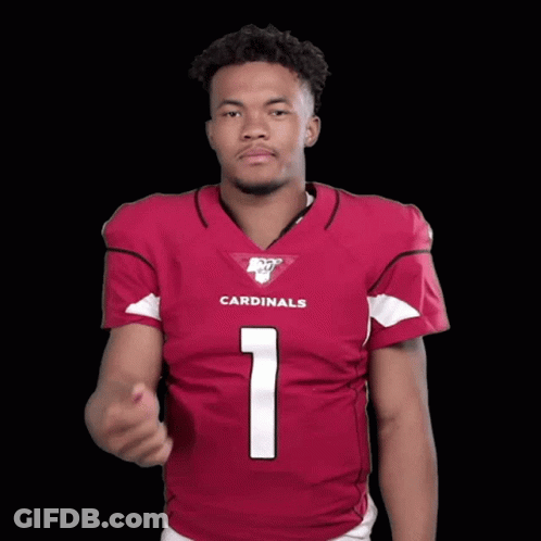 A Man Wearing A Cardinals Jersey Points Up GIF