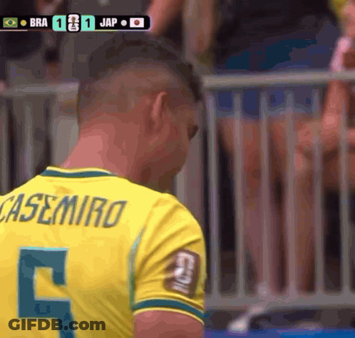 A Man Wearing A Casemiro Jersey Looks Down GIF