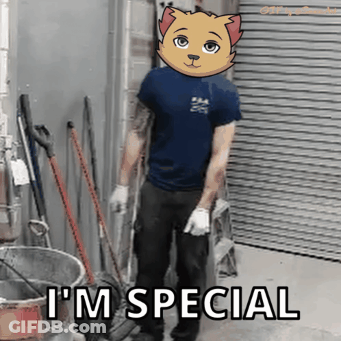 A Man Wearing A Cat Mask Says I 'M Special While Standing In A Warehouse GIF