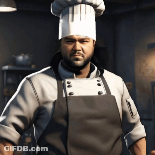 A Man Wearing A Chef 'S Hat And Apron Is Standing In A Kitchen GIF