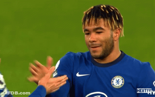 A Man Wearing A Chelsea Jersey Talks To Another Player GIF
